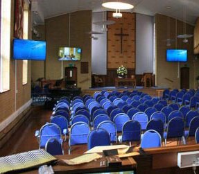 Column speakers installed in a church