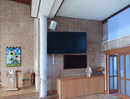 Discreet audio visual installation in a church interior